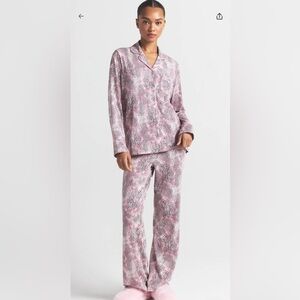 SKIMS Pink and White Pajama Set